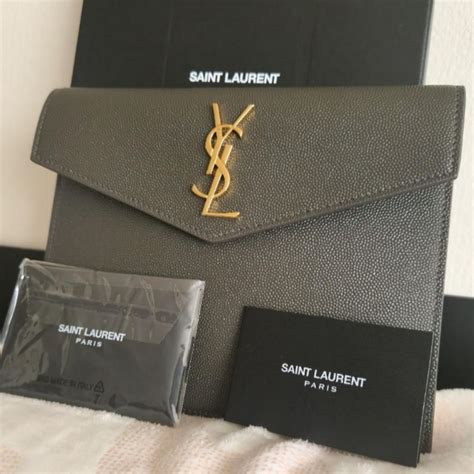 ysl pouch ssense|ysl pouch sale.